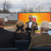 Speaker at solar array ribbon cutting